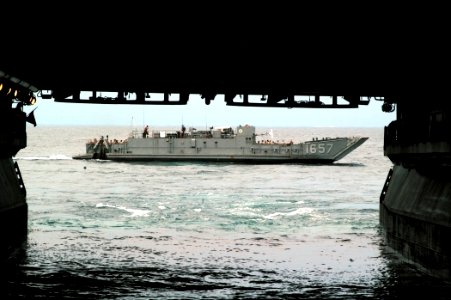 US Navy 070625-N-4014G-275 Marines of the of the 22nd Marine Expeditionary Unit (MEU) depart the well deck of amphibious assault ship USS Kearsarge (LHD 3) aboard a landing craft utility (LCU)