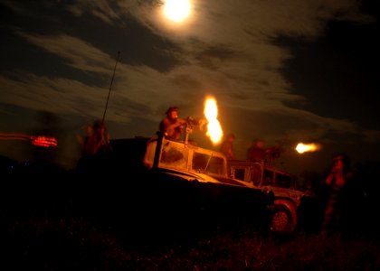 US Navy 070627-N-3857R-003 Two gunners from Naval Mobile Construction Battalion (NMCB) 1 convoy security teams fire the rest of their rounds following the final protective fire scenario of the Battalion's field exercise at Camp