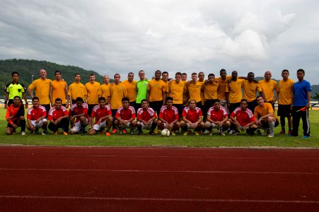 USS Comstock Sailors, 11th MEU Marines play soccer with Royal Malaysian Navy 150127-N-CU914-436