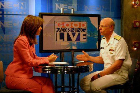 US Navy 070702-N-8110K-002 New England Cable News television anchor, Karen Meyers speaks to Commander, Naval Sea Systems Command, Vice Adm. Paul Sullivan about the Navy's role in the global war on terrorism photo