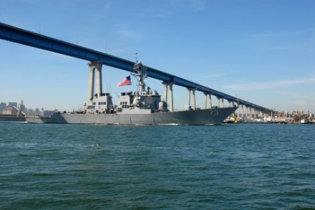 US Navy 070702-N-9909C-004 The Sailors of guided-missile destroyer USS Decatur (DDG 73) safely navigate the ship under the Coronado Bay Bridge as the ship returns to San Diego after a successful missile shot off the coast of Ha