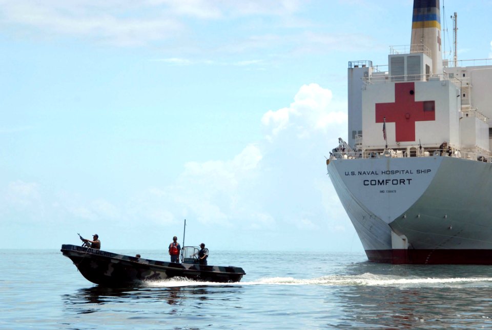US Navy 070628-N-8704K-049 A Guatemalan navy patrol boat provides security for the anchored Military Sealift Command hospital ship USNS Comfort (T-AH 20) during a scheduled stop on a four-month humanitarian deployment