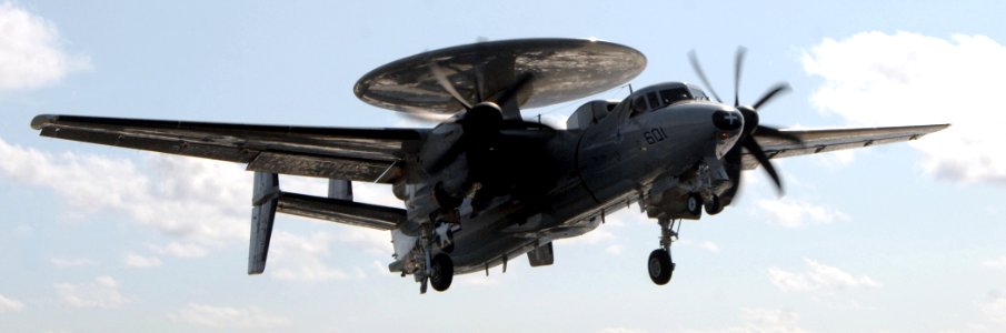 US Navy 070702-0455L-N-001 An E-2C Hawkeye, from the Seahawks of Carrier Airborne Early Warning Squadron (VAW) 126, soars through the sky above Nimitz-class aircraft carrier USS Harry S. Truman (CVN 75)