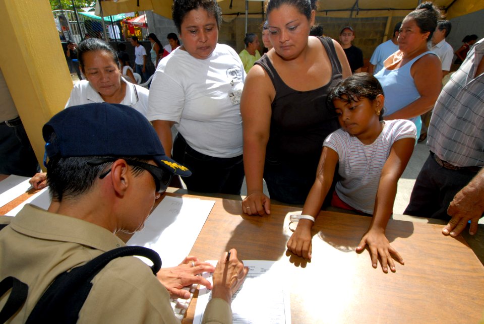 US Navy 070630-N-8704K-021 Capt. Linda Brown-Vidal, attached to the Military Sealift Command hospital ship USNS Comfort (T-AH 20), checks patients in at Medical Center Morales