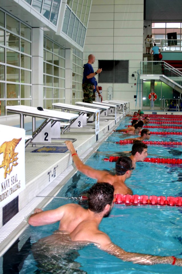 US Navy 070630-N-8110K-012 Swimmers prepare for the first leg of the Navy SEAL Trident Challenge at Boston University during Navy Week Boston
