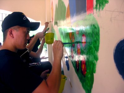US Navy 070702-N-5148B-190 USS Nimitz (CVN 68) Sailors and Marines paint a mural for the Madras Institute to Habilitate Retarded Afflicted, a home for physically and mentally afflicted children