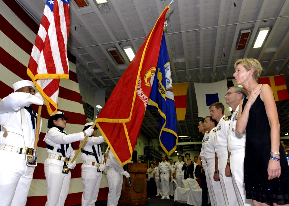 US Navy 070704-N-4954I-053 U.S. Ambassador to the Philippines, the Honorable Kristie A. Kenney, Commander, U.S. 7th Fleet, Vice Adm. Doug Crowder and the official party recognize the presentation of colors during a 4th of July