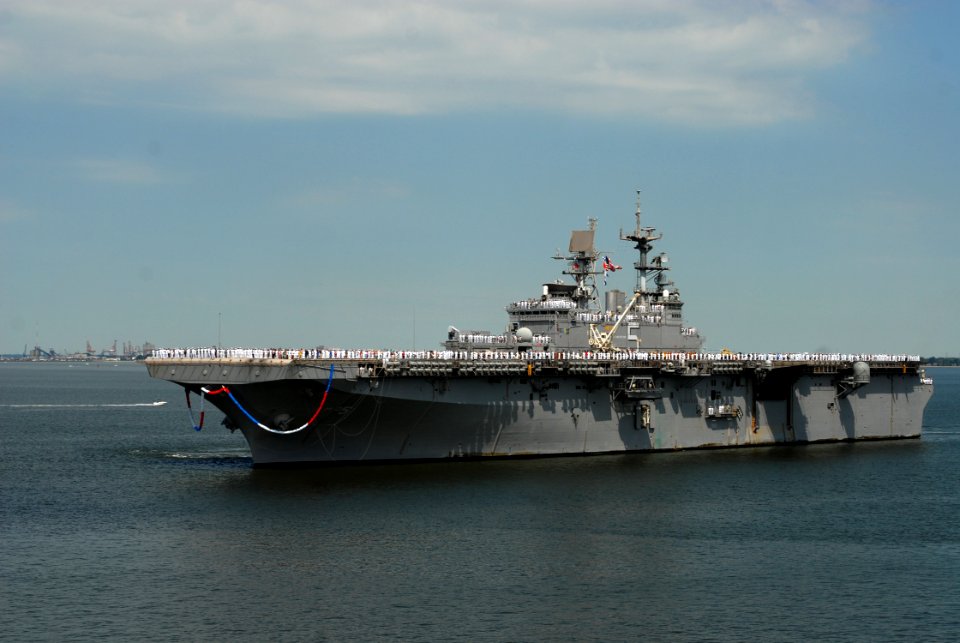 US Navy 070703-N-0841E-002 Sailors and Marines assigned to amphibious assault ship USS Bataan (LHD 5) return to Naval Station Norfolk after completing a scheduled six-month deployment
