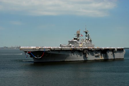US Navy 070703-N-0841E-002 Sailors and Marines assigned to amphibious assault ship USS Bataan (LHD 5) return to Naval Station Norfolk after completing a scheduled six-month deployment photo