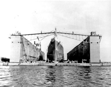 USS Columbia (CL-56) docked in ABSD-1 at Espiritu Santo, in January 1944