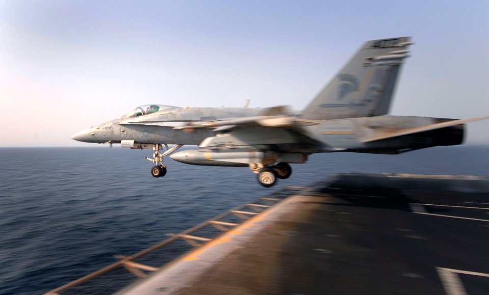 US Navy 070702-N-3729H-115 An F-A-18C Hornet, from the Argonauts of Strike Fighter Squadron (VFA) 147, launches from the flight deck of Nimitz-class aircraft carrier USS John C. Stennis (CVN 74) on a mission to provide support