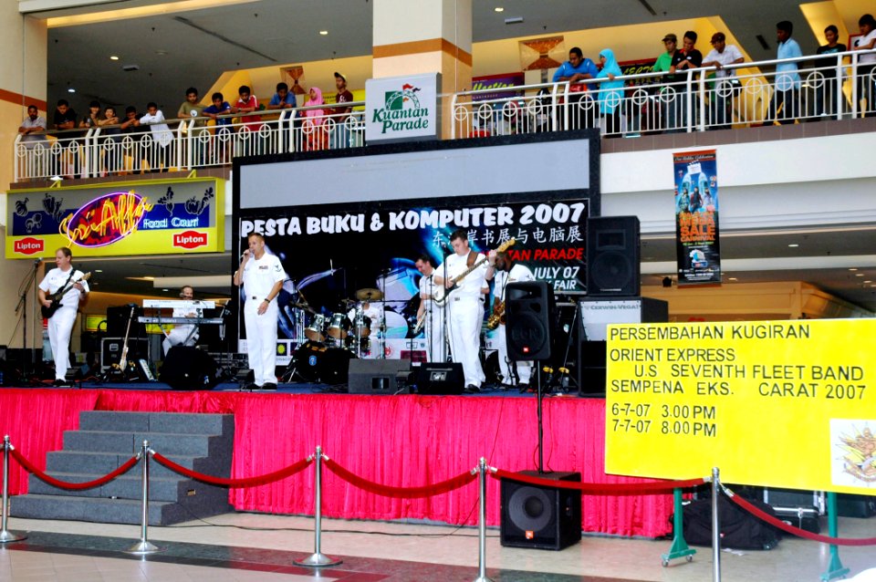 US Navy 070706-N-7783B-003 Members of the 7th Fleet rock band Orient Express perform at the Kuantan Parade Mall during the Malaysian phase of exercise Cooperation Afloat Readiness and Training (CARAT)
