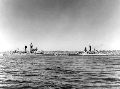 USS Columbus (CG-12) and USS Oklahoma City (CLG-5) moored at San Diego, California (USA), on 14 March 1964 (NH 98673)