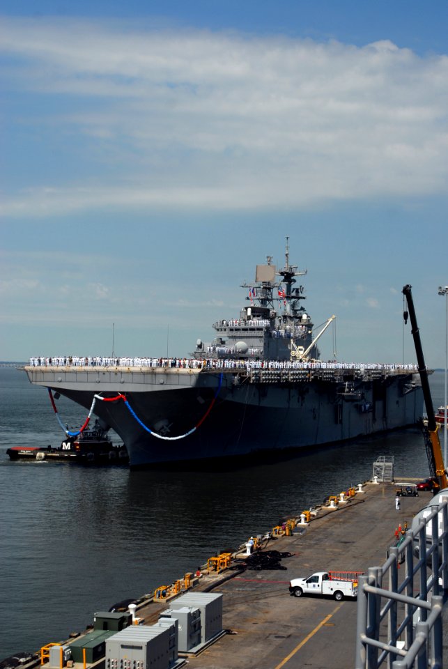 US Navy 070703-N-0841E-004 Sailors and Marines assigned to amphibious assault ship USS Bataan (LHD 5) return to Naval Station Norfolk after completing a scheduled six-month deployment