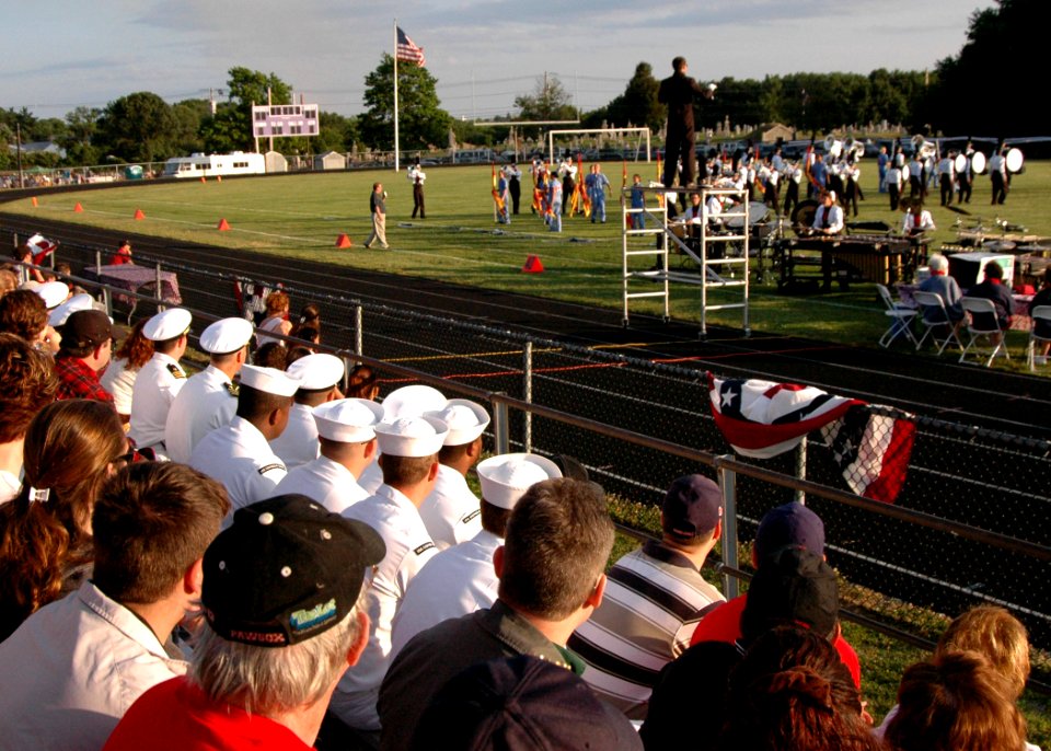 US Navy 070703-N-8497H-228 Sailors from guided-missile frigate USS Stephen W. Groves (FFG 29) watch the Drum and Bugel competition at Hope High School