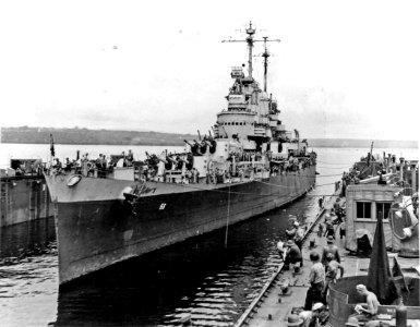 USS Columbia (CL-56) docks in ABSD-1 at Espiritu Santo, in January 1944