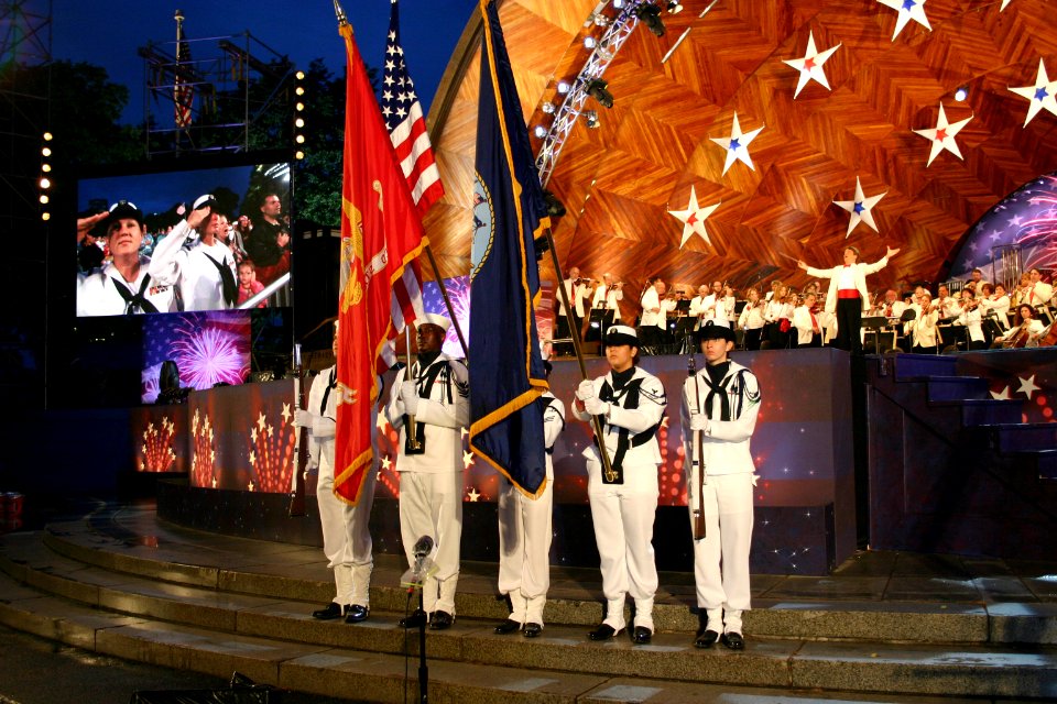 US Navy 070704-N-8110K-009 The USS Wasp (LHD 1) color guard presents the colors while conductor Keith Lockhart leads the world renowned Boston Pops through The Star-Spangled Banner, at the opening ceremony of the annual Boston