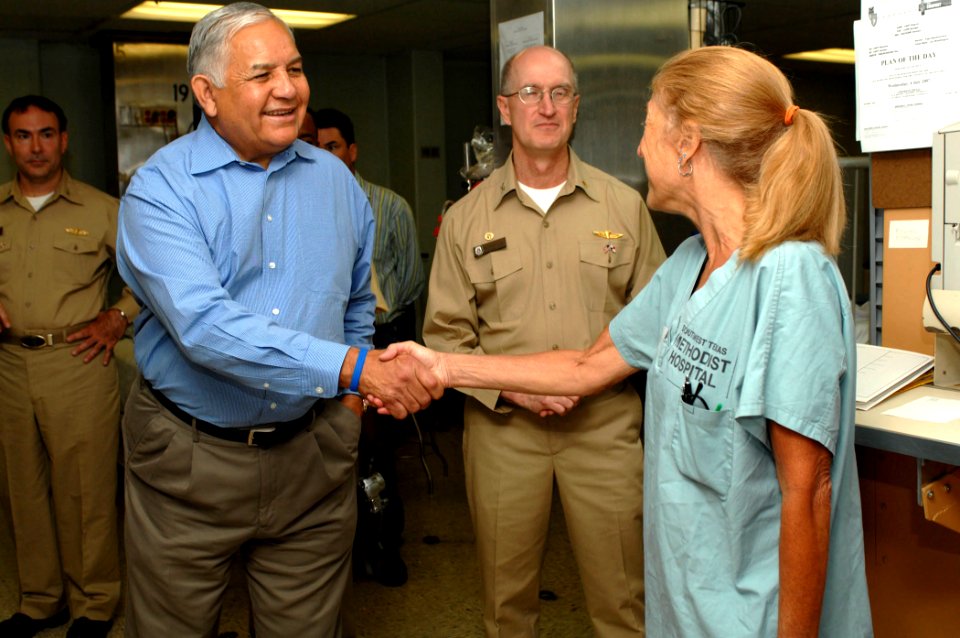 US Navy 070707-N-7088A-012 Rep. Silvestre Reyes greets Marley Gevanthor, a registered nurse and a member of Project Hope, while on a tour of the intensive care unit on board Military Sealift Command hospital ship USNS Comfort (