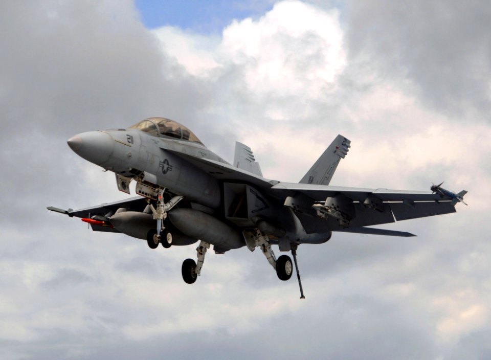 US Navy 070706-N-0455L-014 An F-A-18E Super Hornet, attached to the Swordsmen of Strike Fighter Squadron (VFA) 32, approaches the flight deck for an arrested landing aboard Nimitz-class aircraft carrier USS Harry S. Truman (CVN
