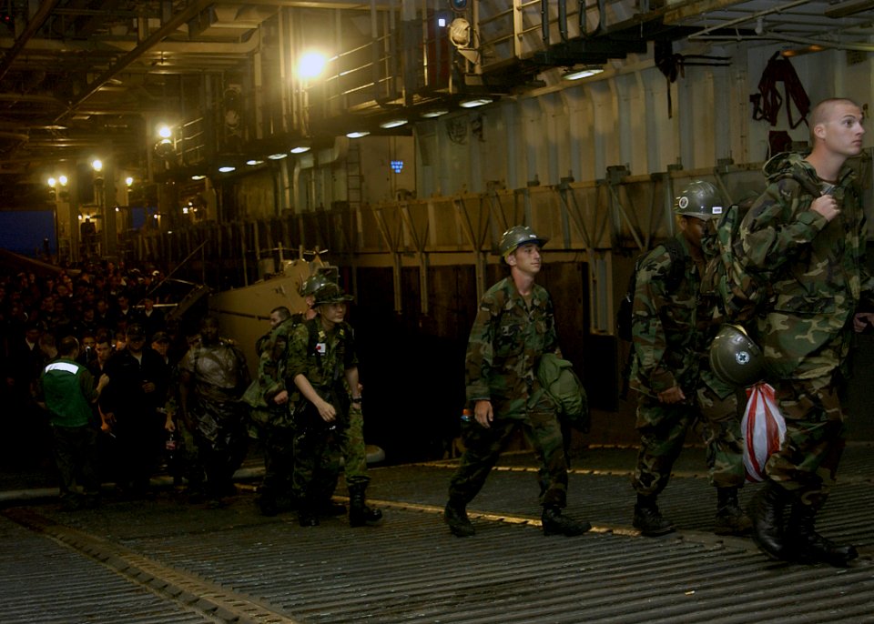 US Navy 070706-N-1752H-034 Pacific Partnership members return aboard the amphibious assault ship USS Peleliu (LHA 5) from Legaspi, Philippines