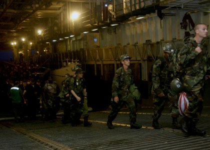 US Navy 070706-N-1752H-034 Pacific Partnership members return aboard the amphibious assault ship USS Peleliu (LHA 5) from Legaspi, Philippines