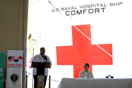 US Navy 070705-N-0194K-161 Camilo Alleyne, minister of health for Panama, speaks during the opening ceremony for the arrival of the Military Sealift Command hospital ship USNS Comfort (T-AH 20), as Ambassador William Eaton, U.S