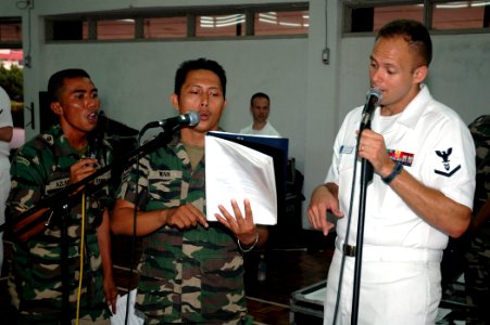 US Navy 070711-N-7783B-005 Musician 3rd Class Spence Haasenritter, the lead singer for the 7th Fleet rock band