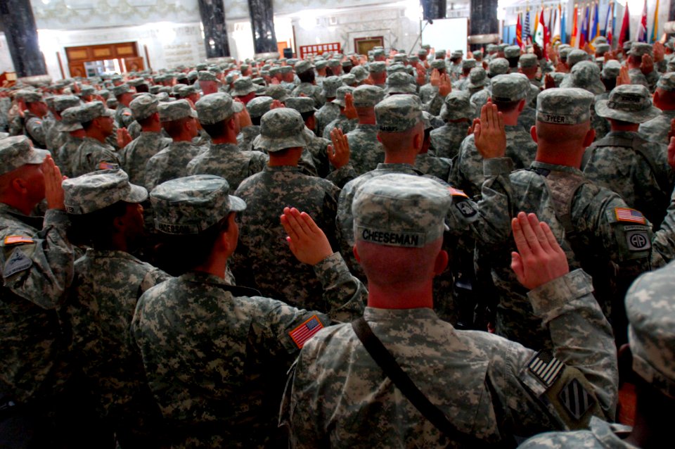 US Navy 070704-N-9818V-283 U.S. service members gather at the Al-Faw Palace for a Multi-National Force-Iraq Reenlistment, Naturalization and Independence Day Ceremony