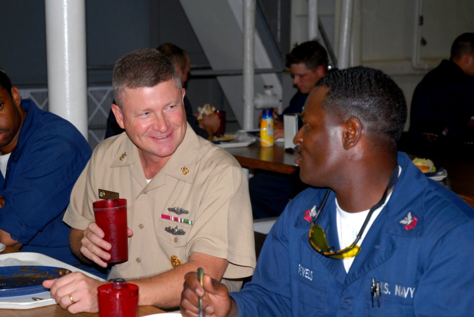 US Navy 070711-N-8102J-047 Commander, U.S. Fleet Forces Command, Fleet Master Chief Rick West chats with Cryptologic Technician (Administration) 1st Class Ronald Revels