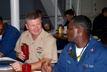 US Navy 070711-N-8102J-047 Commander, U.S. Fleet Forces Command, Fleet Master Chief Rick West chats with Cryptologic Technician (Administration) 1st Class Ronald Revels