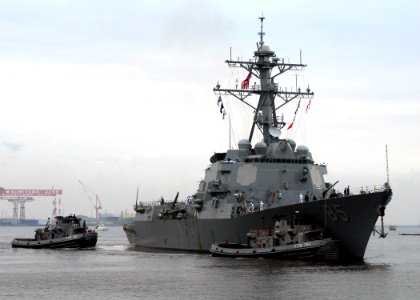 US Navy 070709-N-2638R-001 Large harbor tugs USS Kittanning (YTB 787) and USS Manistee (YTB 782) assist Arleigh Burke-class guided-missile destroyer USS McCampbell (DDG 85) as she pulls into Commander Fleet Activities Yokosuka