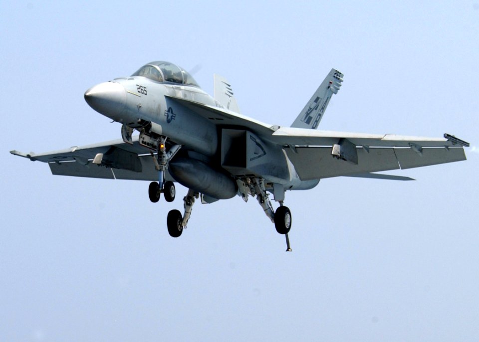 US Navy 070709-N-6854D-002 An F-A-18F Super Hornet, from the Fighting Checkmates of Strike Fighter Squadron (VFA) 211, prepares to land on the flight deck of the Nimitz-class aircraft carrier USS Dwight D. Eisenhower (CVN 69)