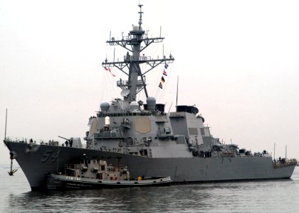 US Navy 070710-N-0483B-001 Large harbor tug Manistee (YTB 782) assists Arleigh Burke-class guided-missile destroyer USS Curtis Wilbur (DDG 54) as she pulls into forward deployed operating base Commander Fleet Activities Yokosuk