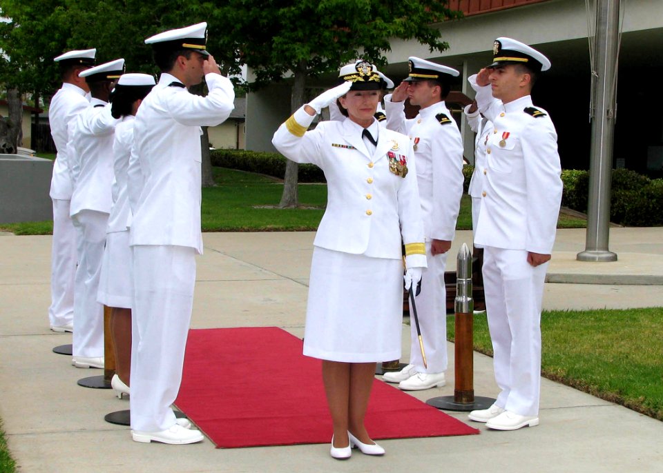 US Navy 070706-N-8547M-019 Sideboys salute Rear Adm. Moira N. Flanders as she arrives as part of the official party for the Center for Seabees and Facilities Engineering (CSFE) change of command