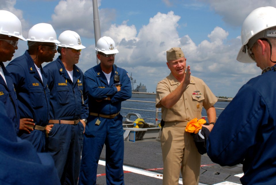 US Navy 070711-N-8102J-007 Commander, U.S. Fleet Forces Command, Fleet Master Chief Rick West is greeted by the chief petty officer's mess aboard guided-missile cruiser USS Philippine Sea (CG 58) during a recent visit to