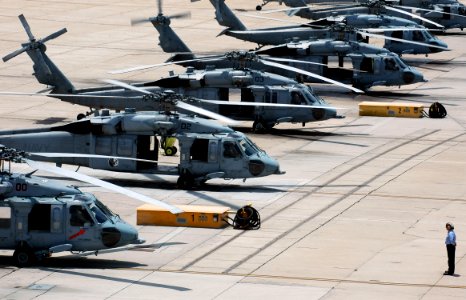 US Navy 070710-N-1328S-003 A plane captain assigned to Helicopter Sea Combat Squadron (HSC) 3 communicates with pilots and aircrew prior to take-off on board Naval Base Coronado