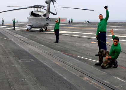 US Navy 070710-N-6854D-002 Sailors perform a no-load test on an aircraft catapult as part of pre-flight operations aboard the Nimitz-class aircraft carrier USS Dwight D. Eisenhower (CVN 69)