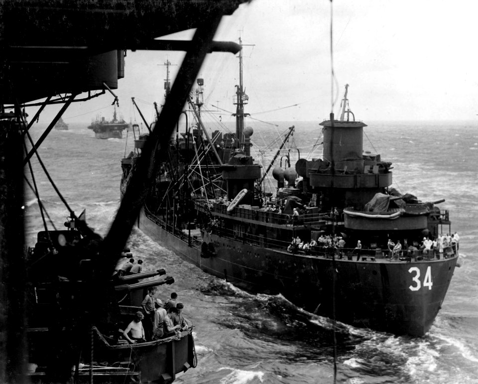 USS Chicopee (AO-34) alongside USS Wasp (CV-18) 1945