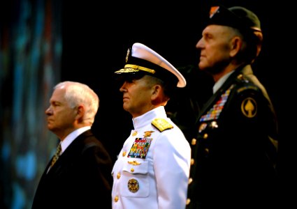 US Navy 070709-D-7203T-014 Secretary of Defense Robert M. Gates, Adm. Eric T. Olson, commander of U.S. Special Operations Command, and Army Gen. Doug Brown, outgoing commander, stand at attention during the change of command ce