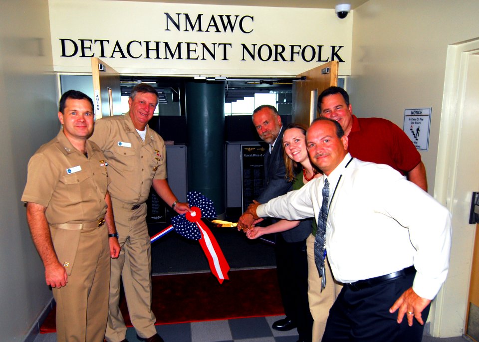 US Navy 070712-N-8907D-005 Rear Adm. John Waickwicz, commander of Naval Mine and Anti-Submarine Warfare Command (NMAWC), and other members of NMAWC cut the ribbon for the official opening of the command's new building at
