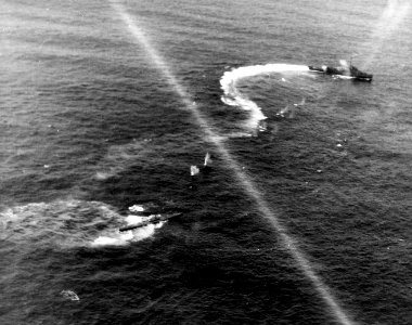USS Chatelain (DE-149) attacking the German submarine U-515 on 9 April 1944 (80-G-227192)