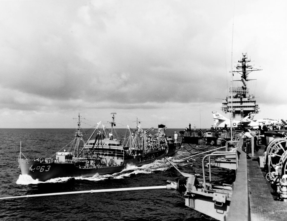 USS Chipola (AO-63) alongside USS Constellation (CVA-64) in March 1964