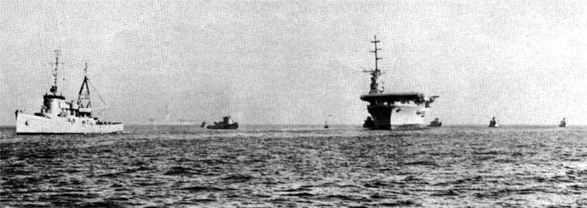 USS Chowanoc (ATF-100) tows USS Philippine Sea (CV-47) c1958
