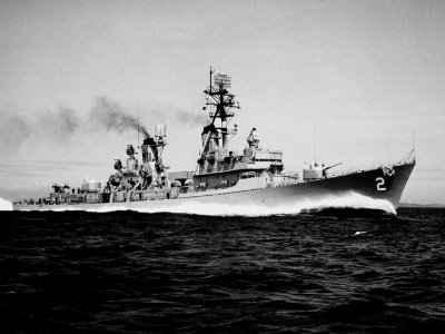 USS Charles F. Adams (DDG-2) underway at high speed while running trials, on 31 August 1960 (NH 106724)