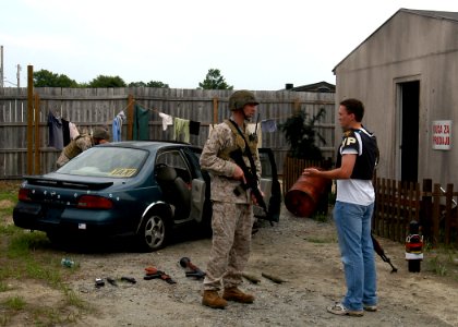 US Navy 070720-N-1082Z-006 Sailors and Marines of the Navy and Marine Corps Intelligence Center (NMITC) conduct training exercises in an area designed to simulate conditions in Iraq and Afghanistan