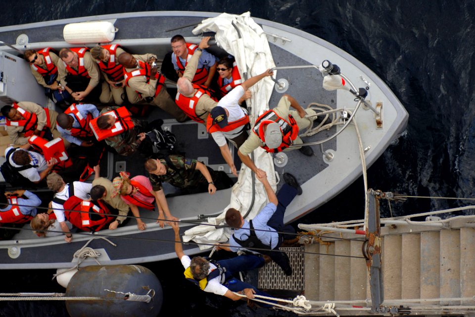 US Navy 070718-N-0194K-134 By way of a 75-foot-long accommodation ladder, Sailors assigned to the Military Sealift Command hospital ship USNS Comfort (T-AH 20), board a life boat