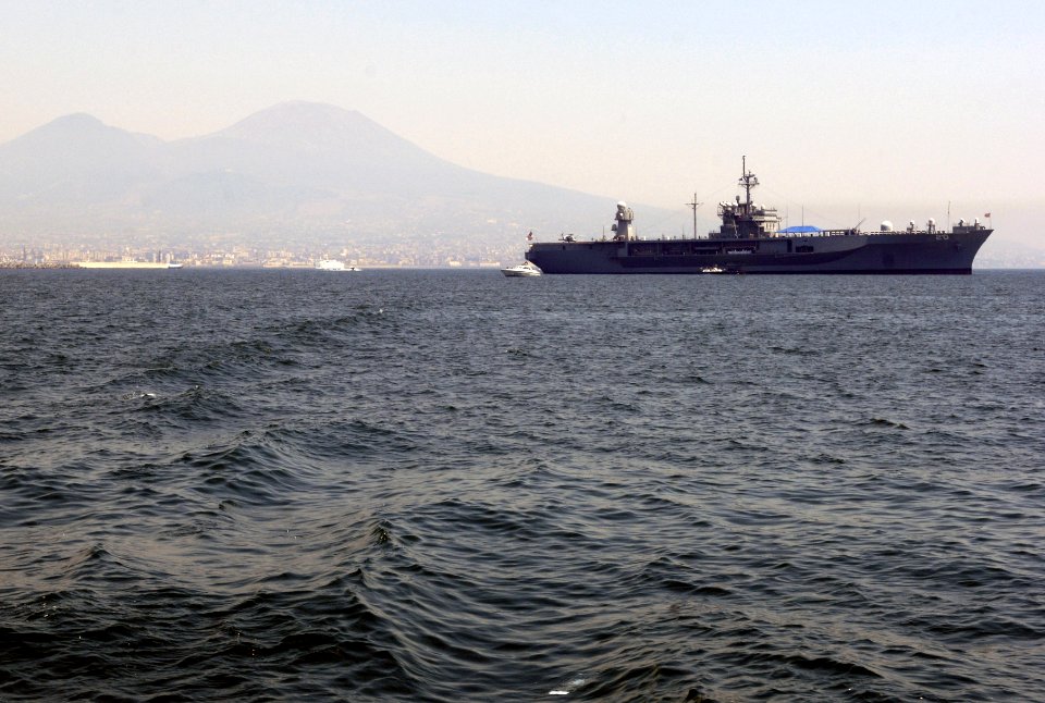 US Navy 070718-D-7203T-003 Blue Ridge-class amphibious command ship USS Mount Whitney (LCC 20) is anchored between Naples, Italy and Mt. Vesuvius