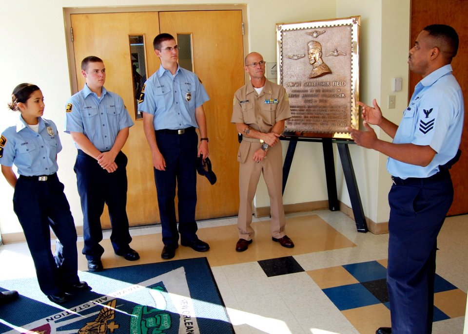 US Navy 070721-N-7427G-003 Air Traffic Controller 1st Class Terrell Moore explains the history of Callendar Field to Sea Cadets from the greater New Orleans region