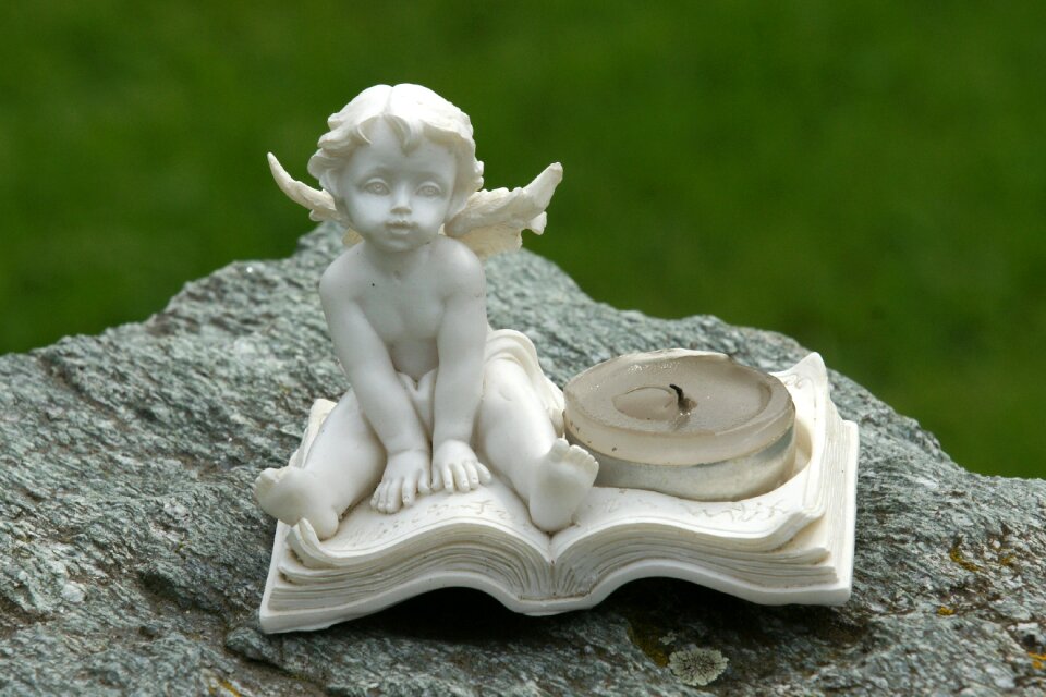 Guardian angel sculpture symbol