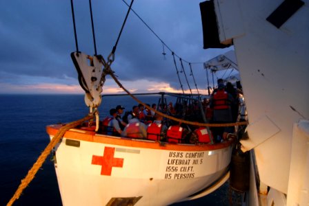 US Navy 070720-N-8704K-001 Military Sealift Command hospital ship USNS Comfort (T-AH 20) personnel depart the ship via lifeboat en route to clinic sites ashore in Nicaragua